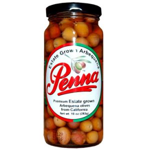 Jar of Penna Estate Grown Arbequina olives from California, featuring light-coloured olives and a branded label.
